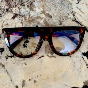 Celine-esque glasses. Animal print. Clear glass.